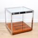 A vintage mid-century glass and rosewood side table by Merrow Associates