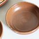 Set of 4 plates in sandstone of Saint Amand signed