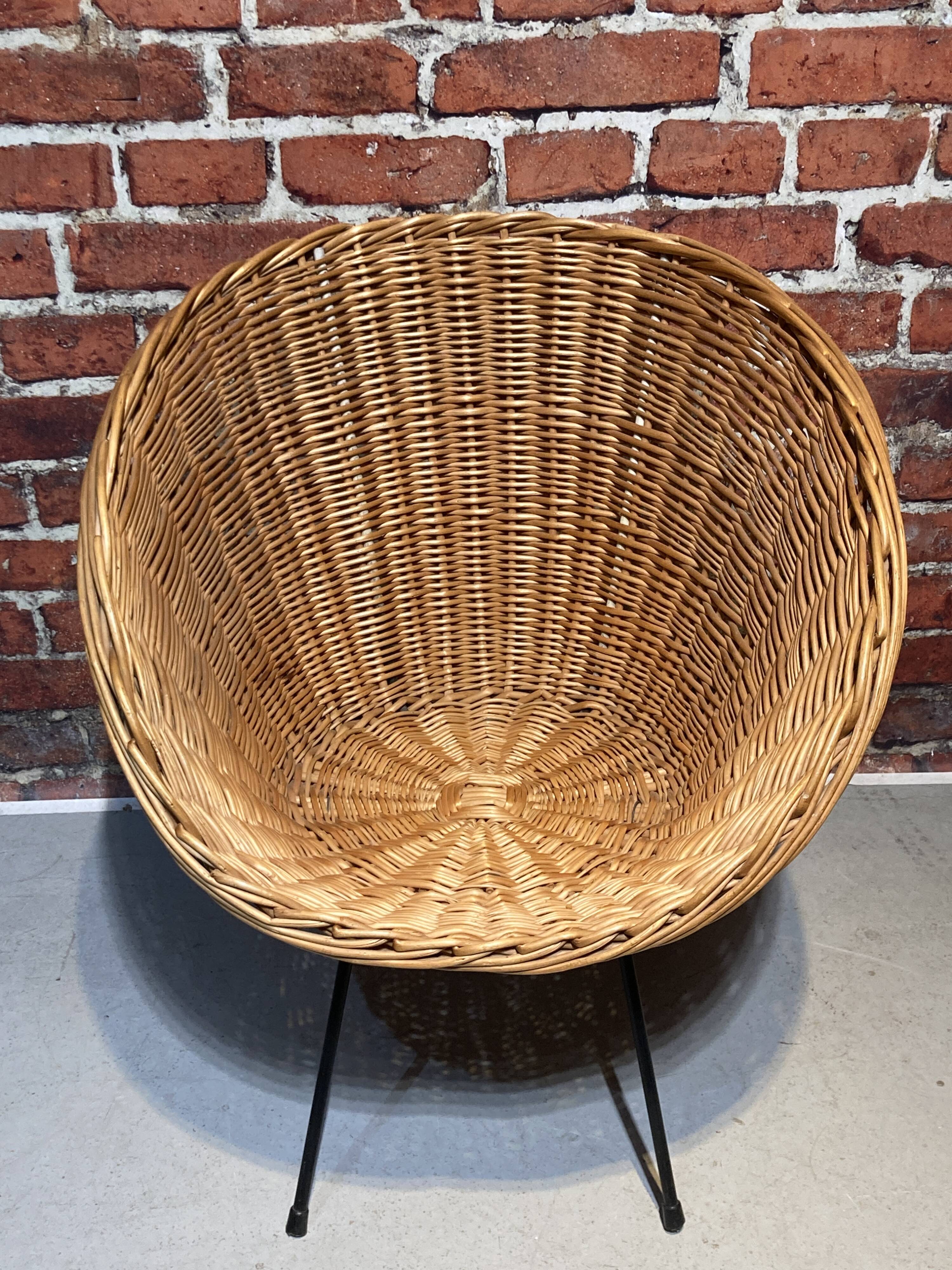 Wicker and metal armchair
