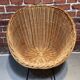 Wicker and metal armchair