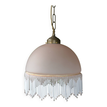 Lustrous suspension in glass paste, glass and ceramic pendants.