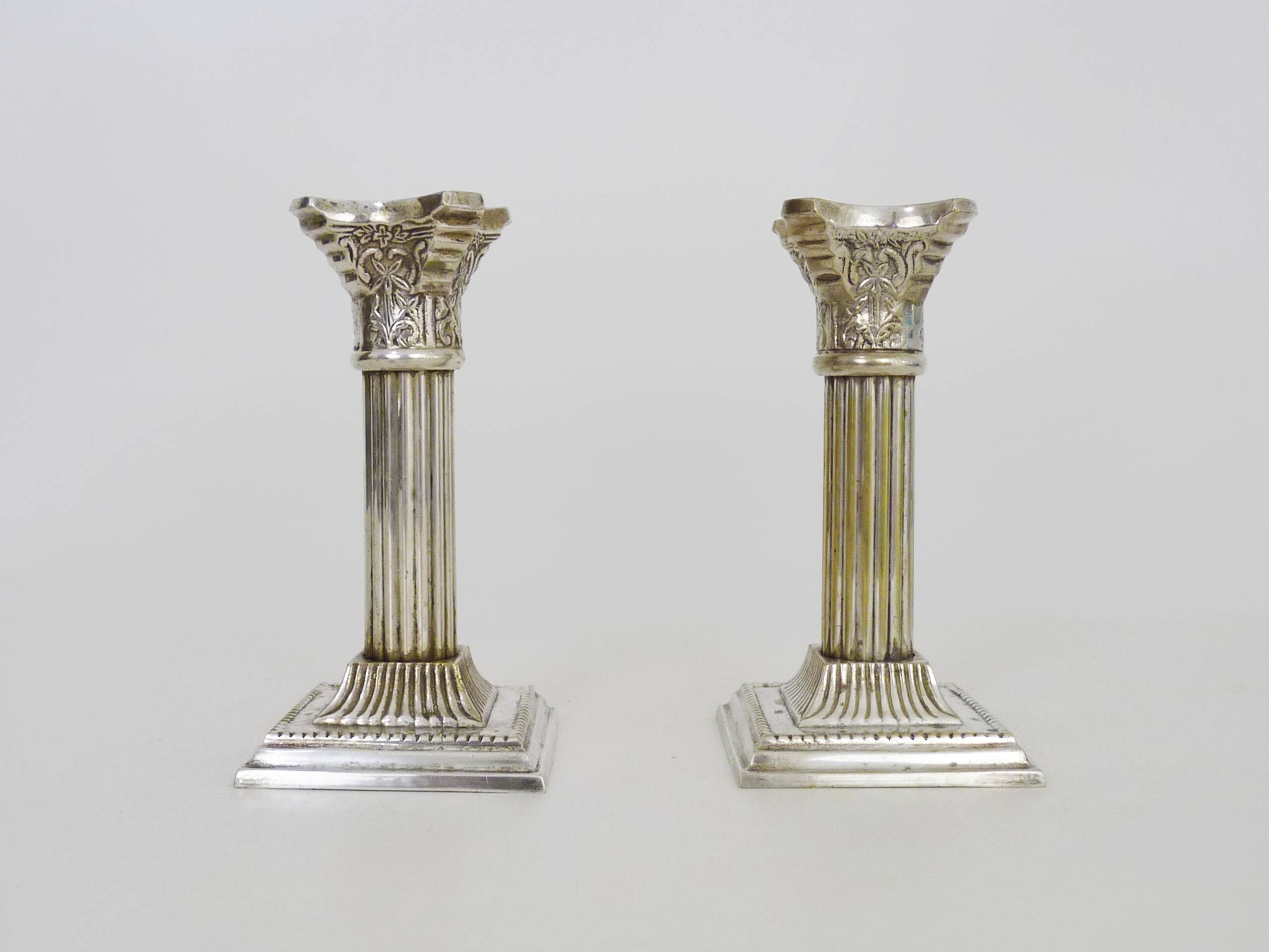 Pair of Antique Silver Plated Corinthian Candlesticks