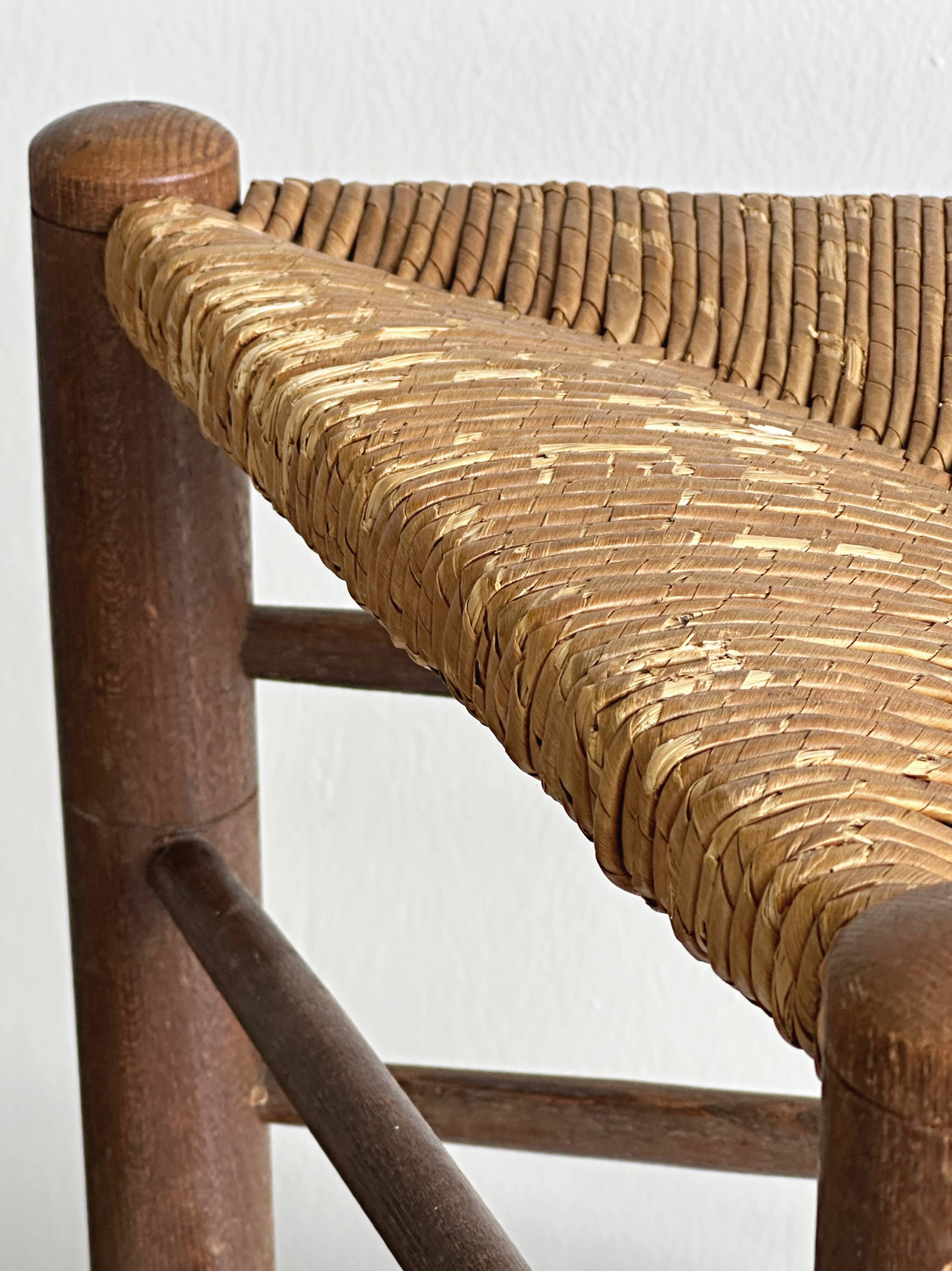 Triangular turned wooden stool