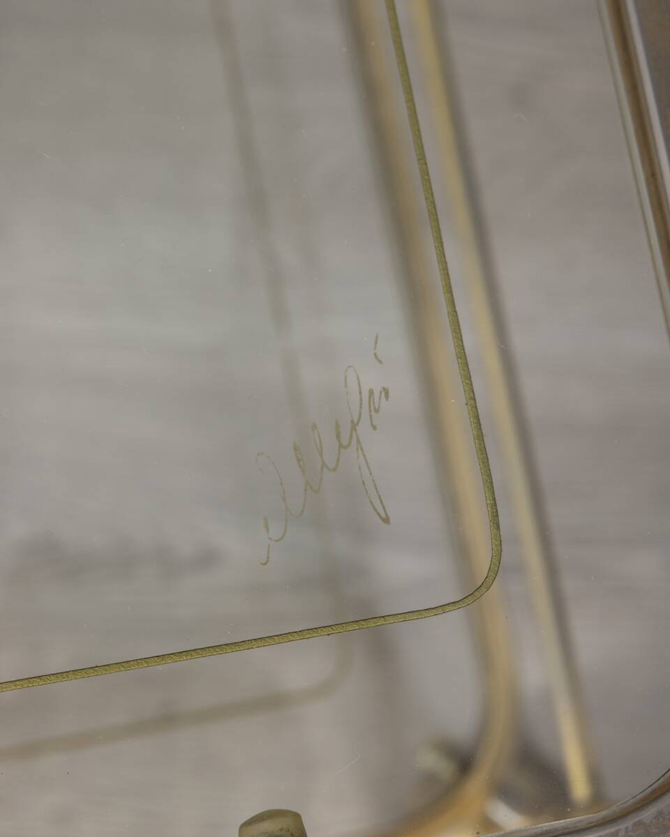 Vintage 1970s gold-plated metal and glass coffee table, designed by Allegri
