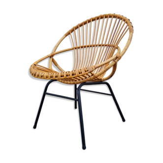 Vintage rattan shell armchair from the 60s