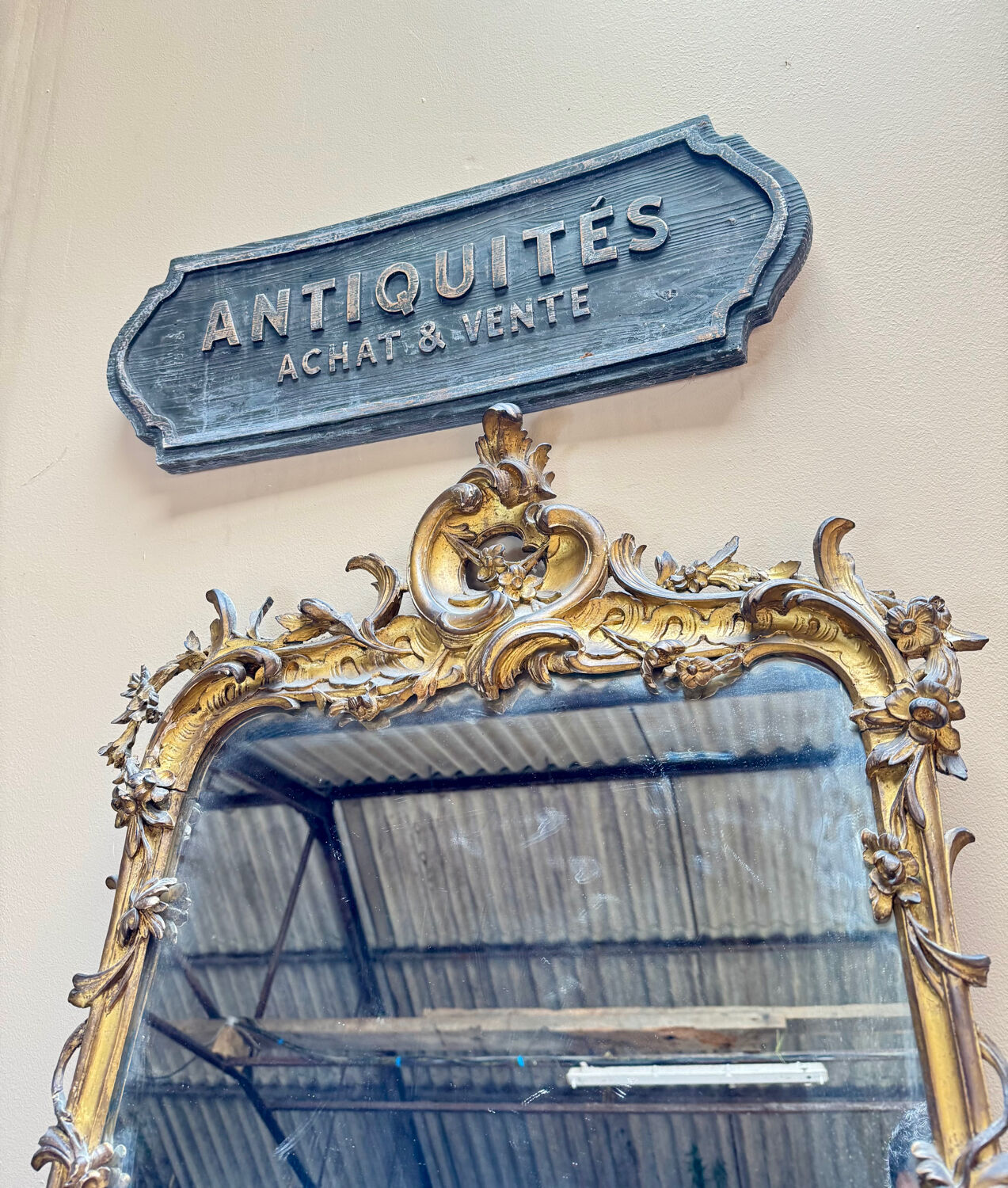 Louis XV period wooden and gilded stucco mirror, 18th century