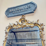 Louis XV period wooden and gilded stucco mirror, 18th century