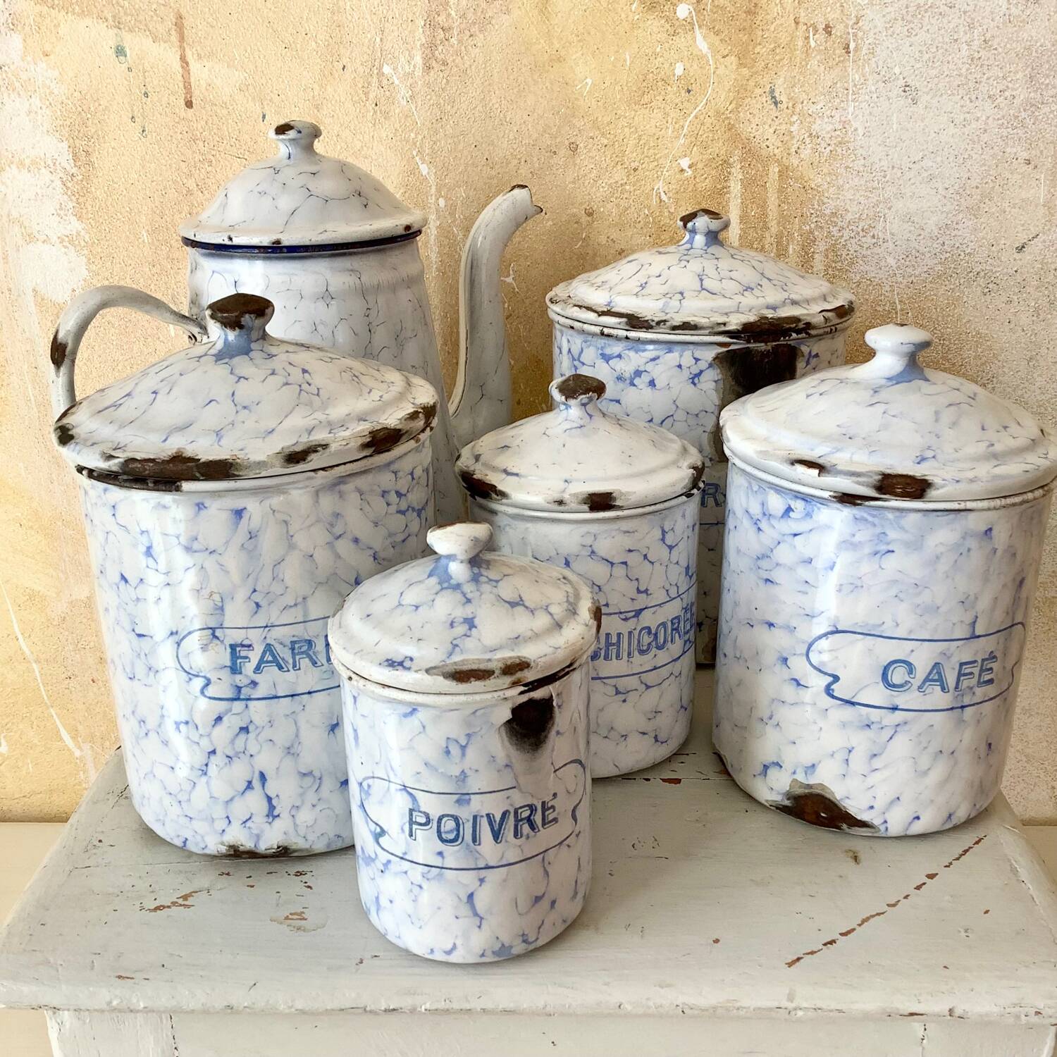 Spice jars and coffee maker in enameled sheet metal