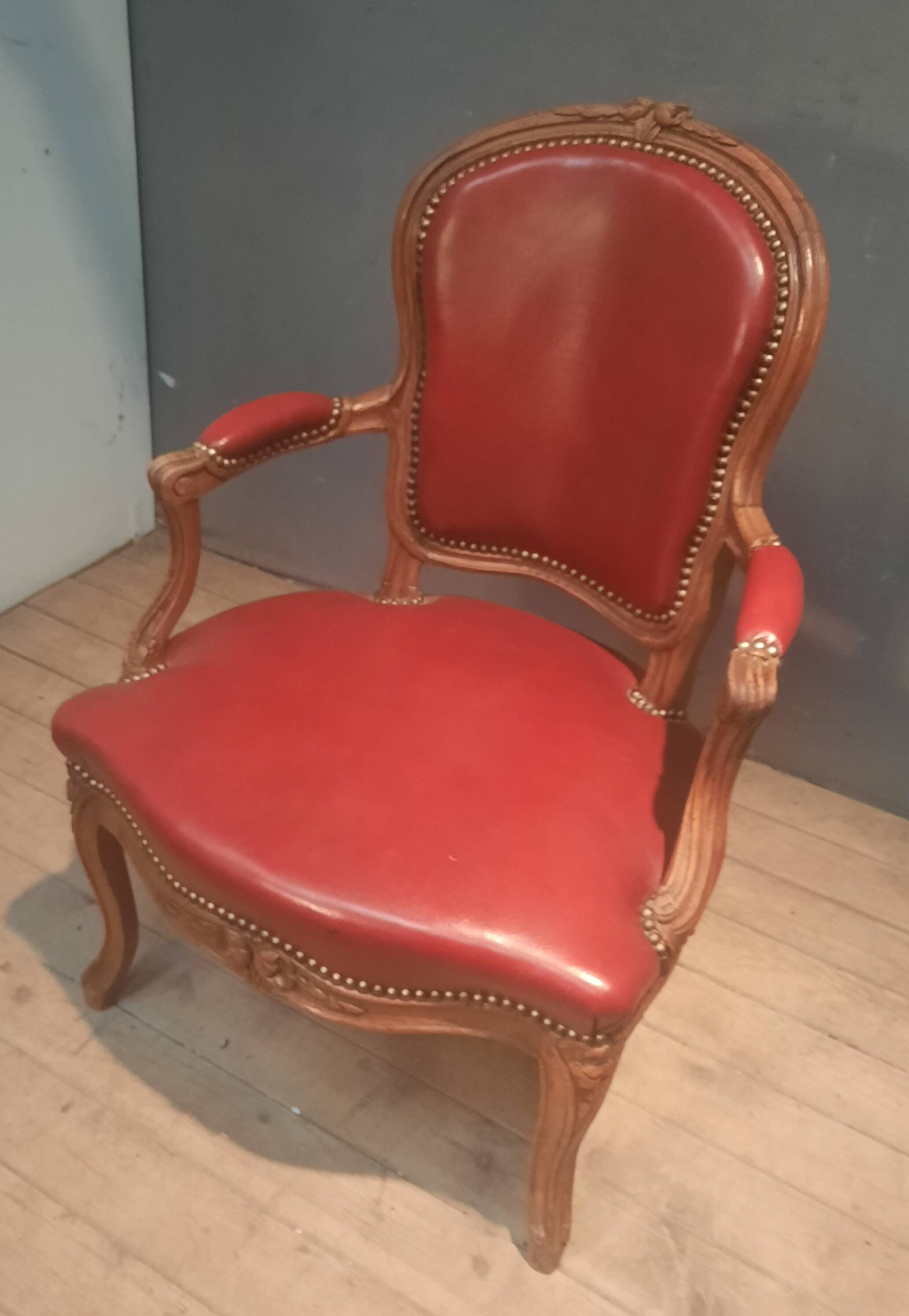 Louis XV period armchair covered in leather.