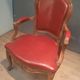 Louis XV period armchair covered in leather.