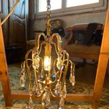 Chandelier with tassels and cage