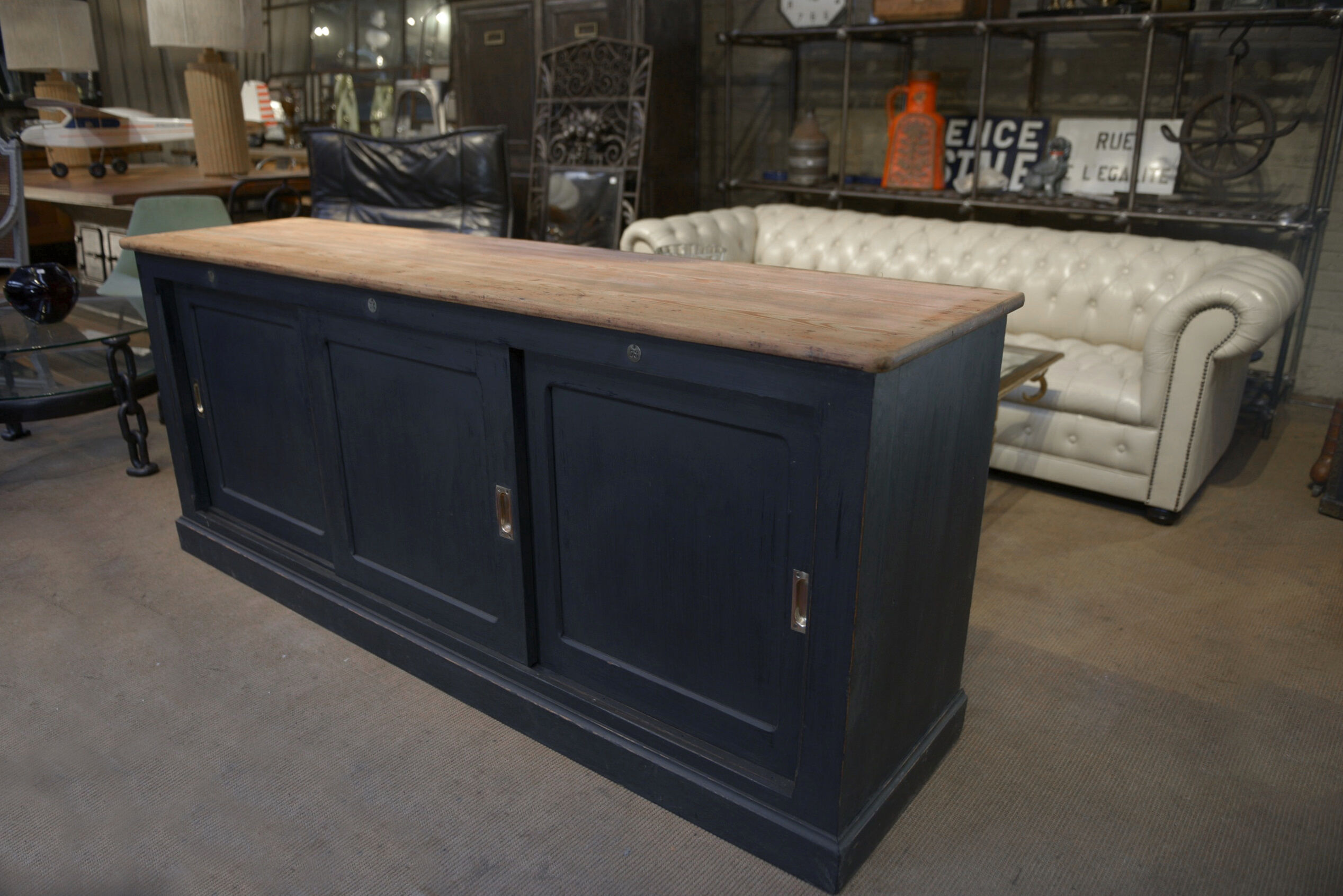 Low cabinet with sliding doors in fir 1930