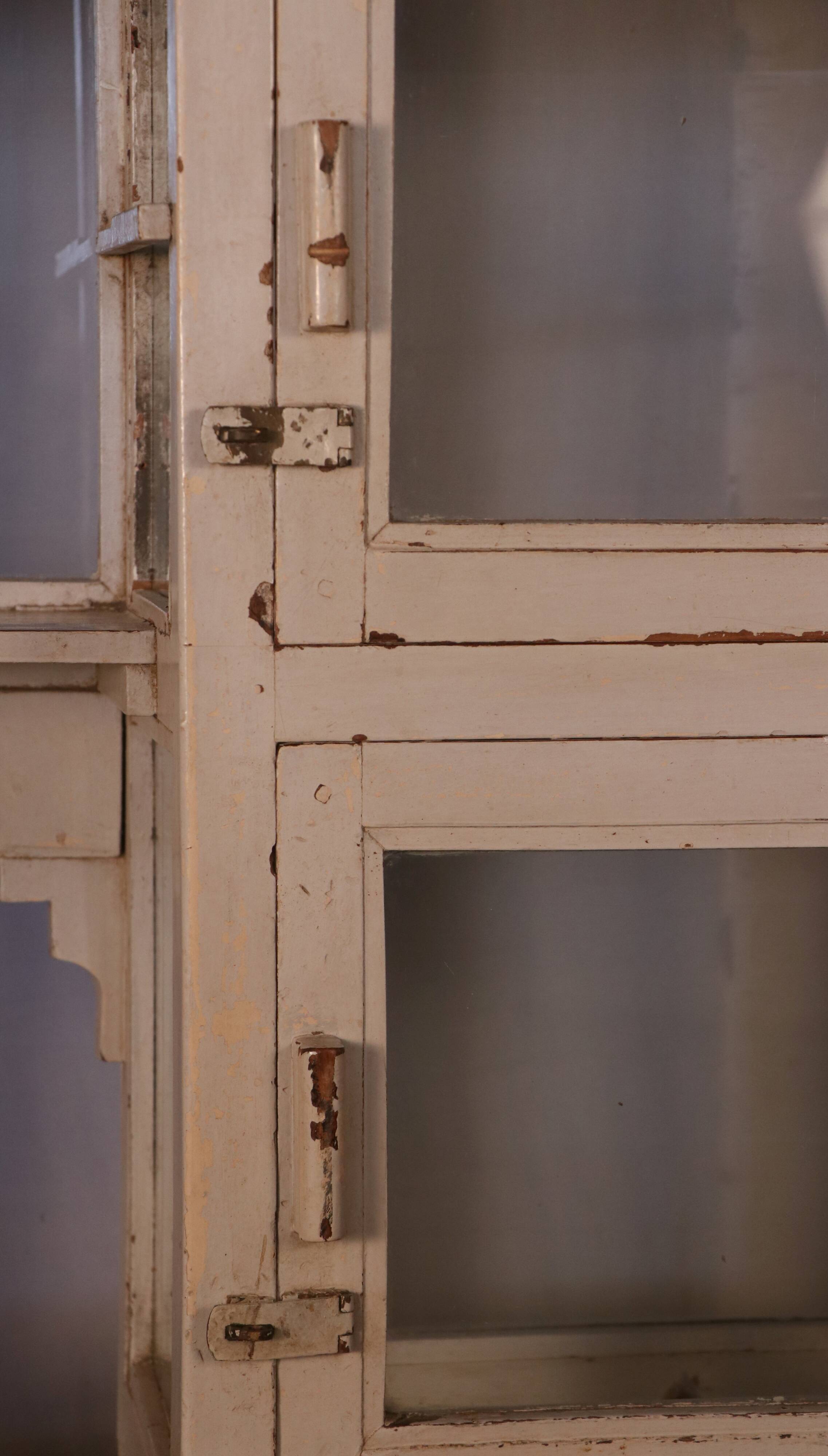 Merchant counter in Burmese teak with original white patina