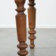 Antique English drop-leaf dining table made of walnut with elegant legs