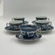 Set of 5 vintage porcelain cups and saucers with Blue Willow pattern.