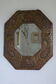 Antique bevelled artisanal mirror in repoussé copper - 54x45cm