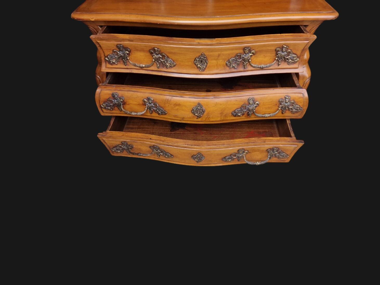 Solid wood commode in an antique style.