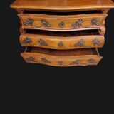 Solid wood commode in an antique style.