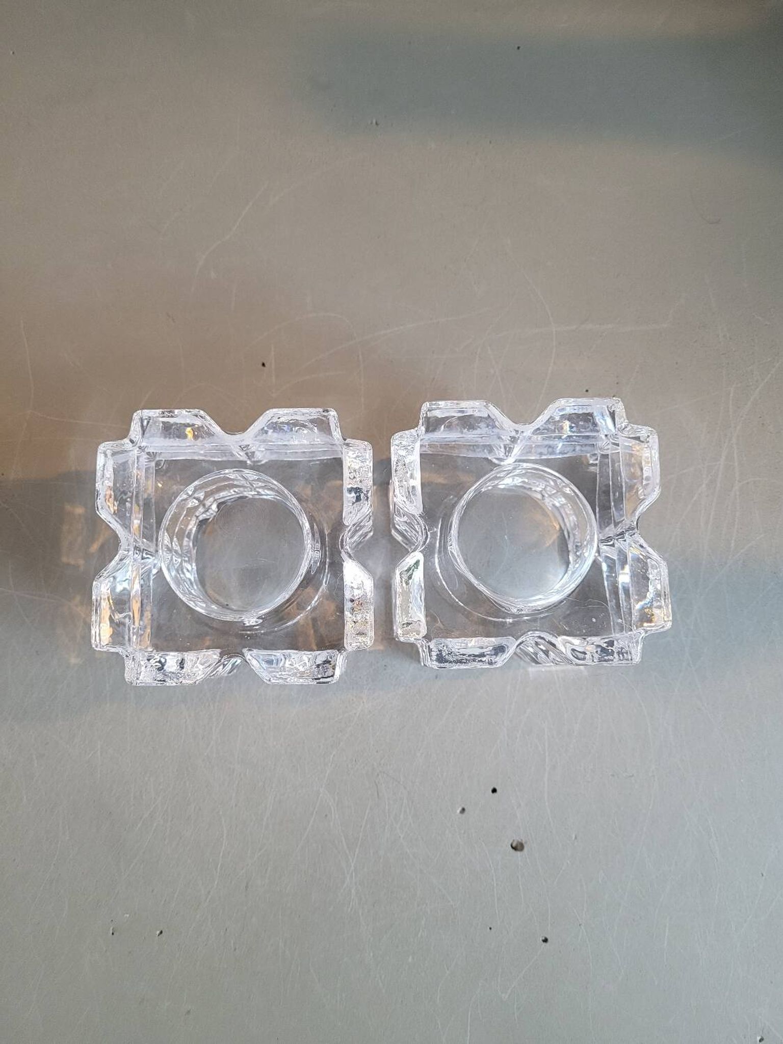Pair of faceted glass tealight candle holders