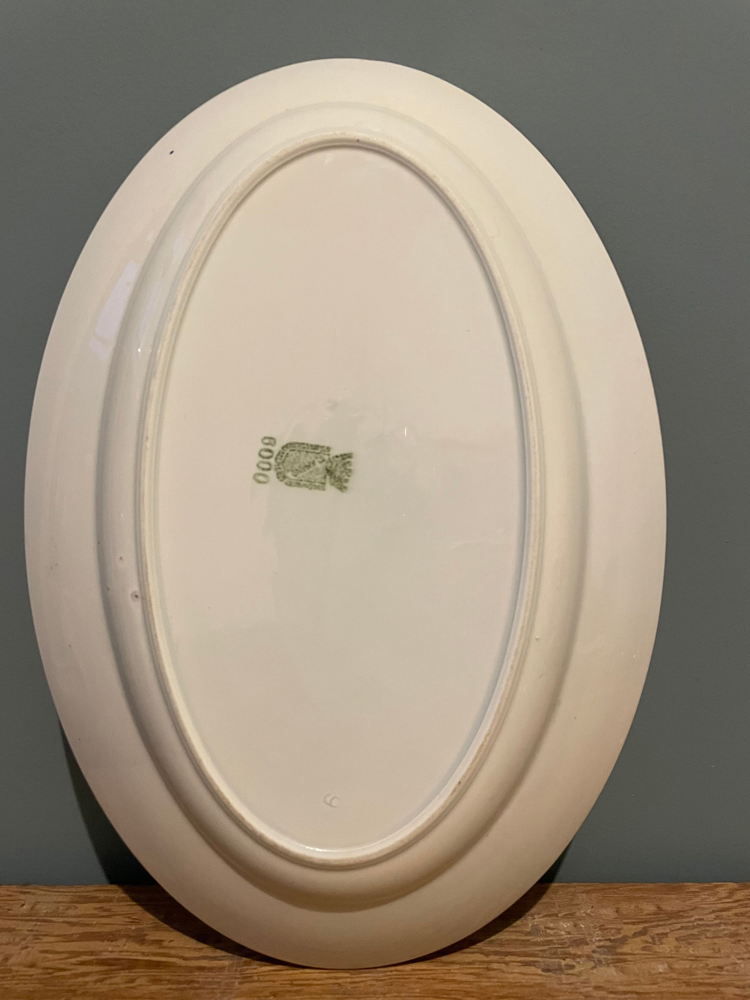 Oval flat Terre de Fer XIXth in St Amand earthenware