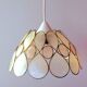 Suspension nacre et laiton