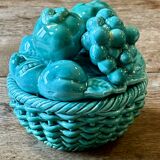 Vintage green earthenware plate/basket with fruit decorations.
