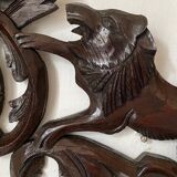 Antique carved wooden pediment with lions and medallion