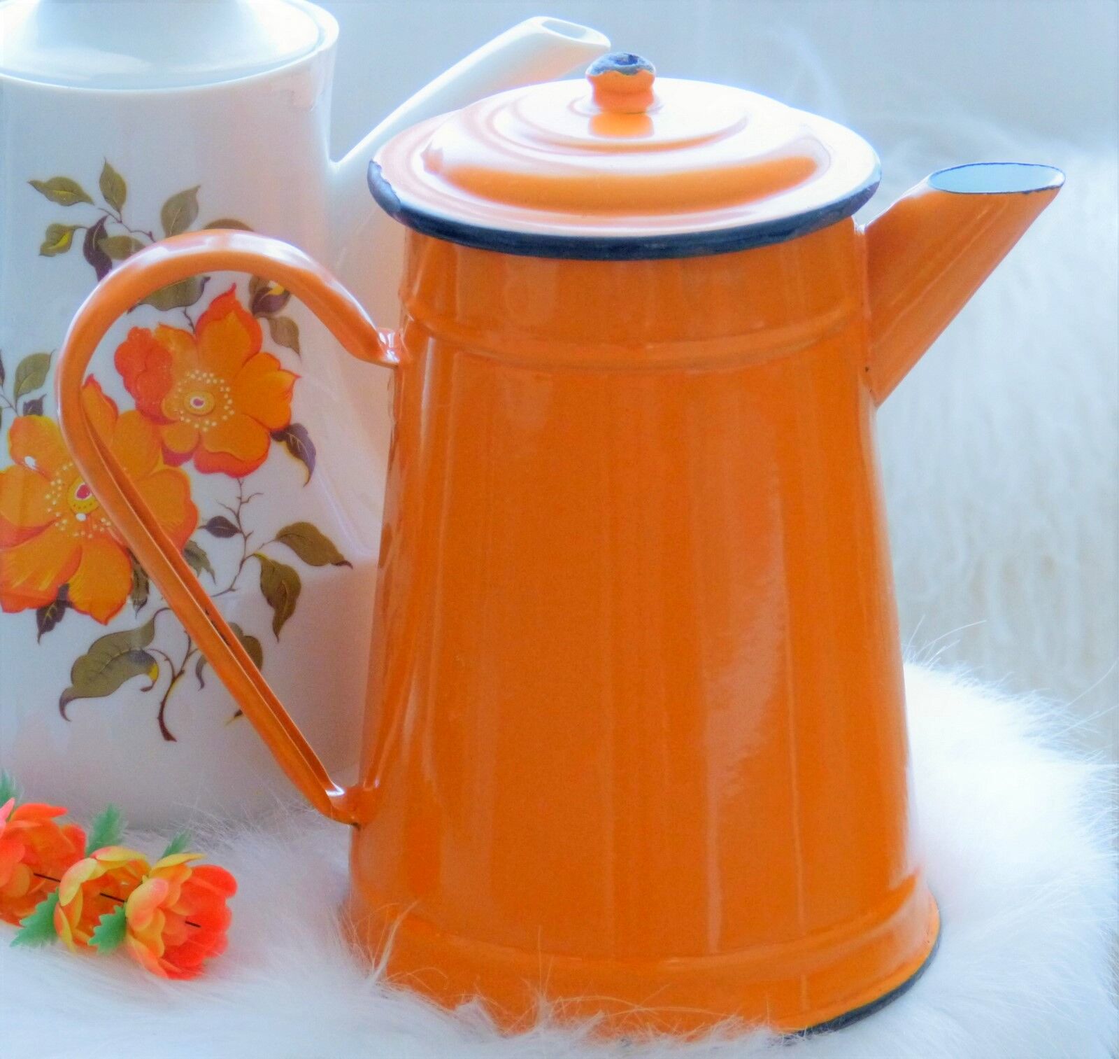 Old orange enamel coffee maker