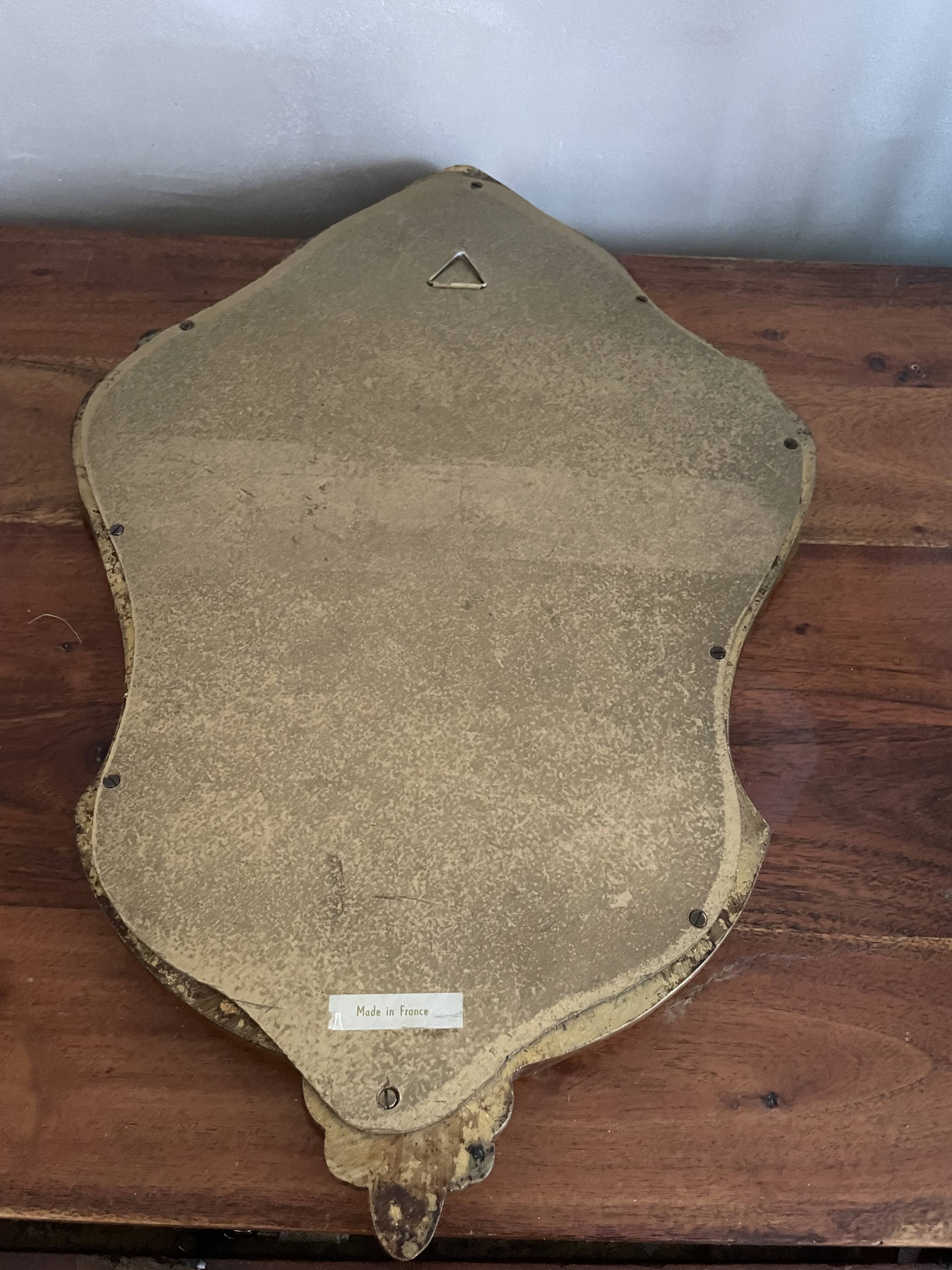 Baroque style mirror in gilded wood