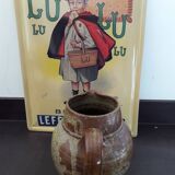 Brown stoneware pitcher