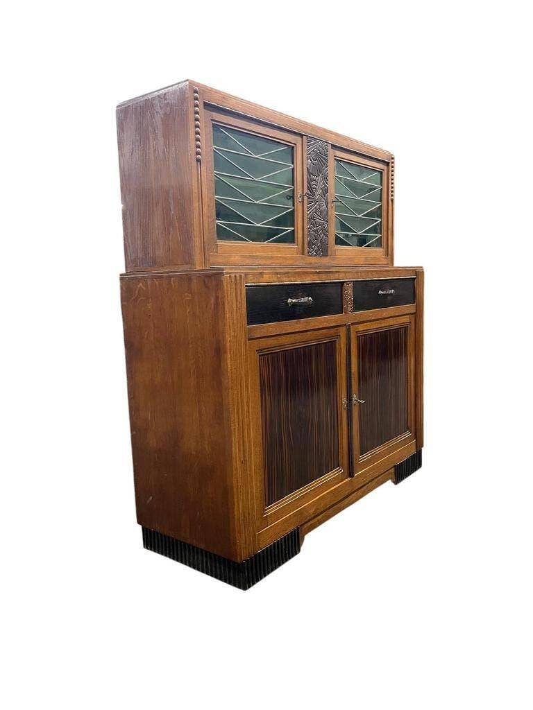 Vintage Art Deco display cabinet in wood with green stained glass.