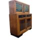 Vintage Art Deco display cabinet in wood with green stained glass.