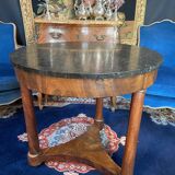 Large circular Empire pedestal table on 3 walnut columns with marble top, 19th century