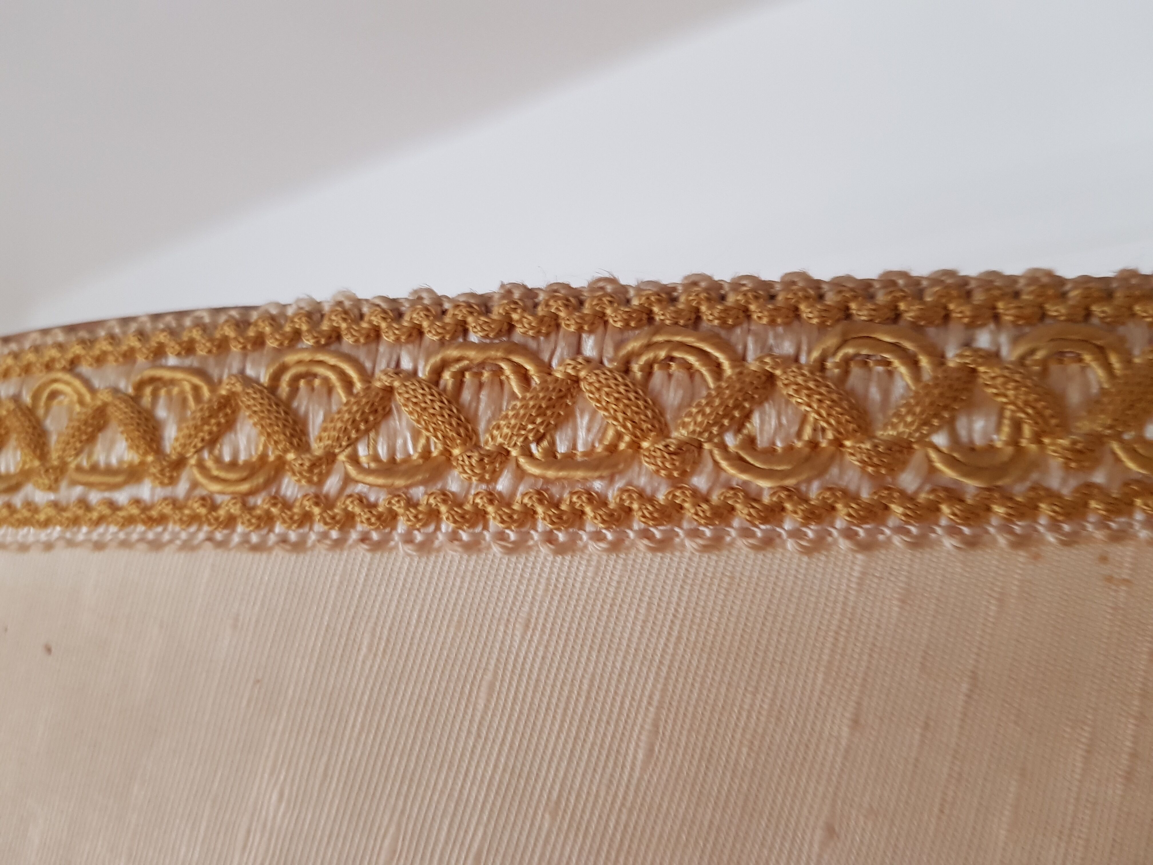 Authentic antique lamppost in gilded brass lampshade in fringed cream fabric