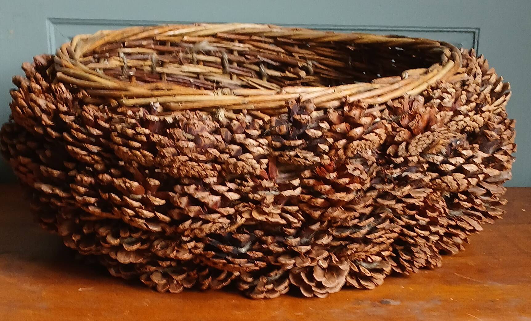 XL handmade wicker & pine cone Adirondack basket, circa 1930.