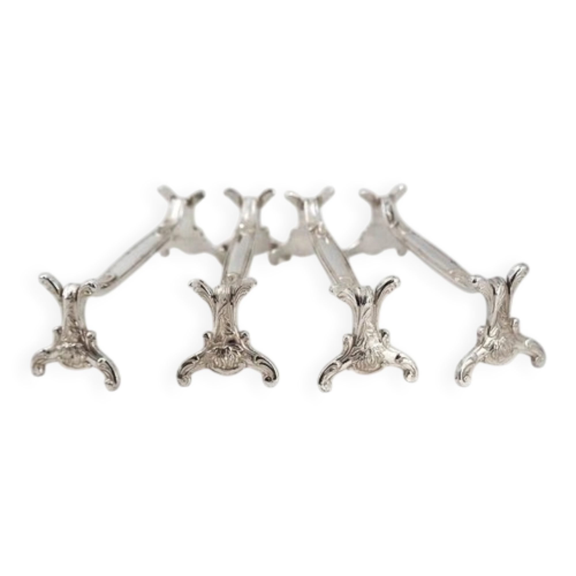 Christofle Chrysanthème, 4 silver-plated knife rests, excellent condition.