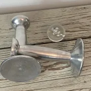 Pair of minimalist polished aluminium candle holders