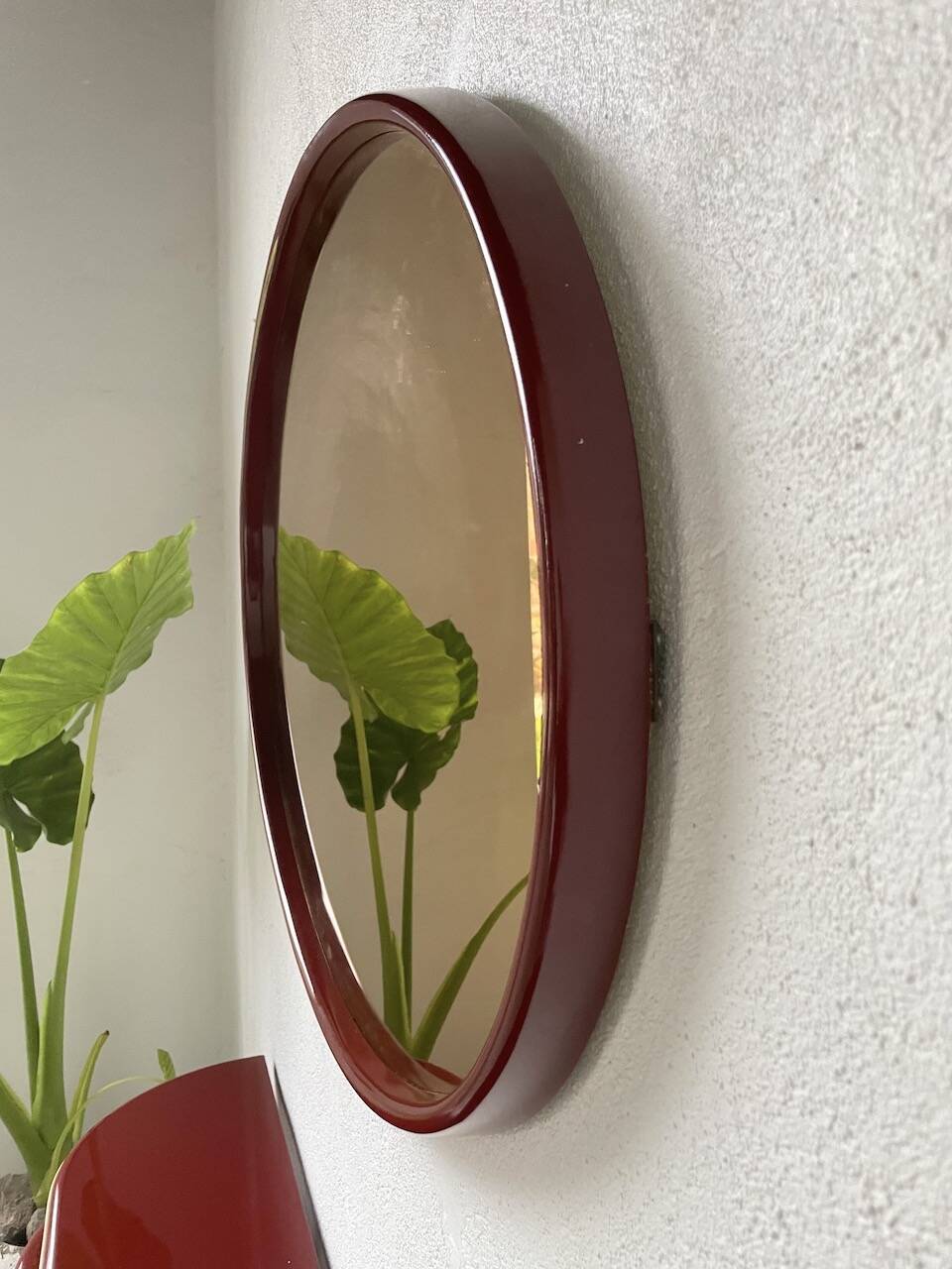 Red lacquered console and its mirror from the 80s