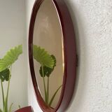 Red lacquered console and its mirror from the 80s