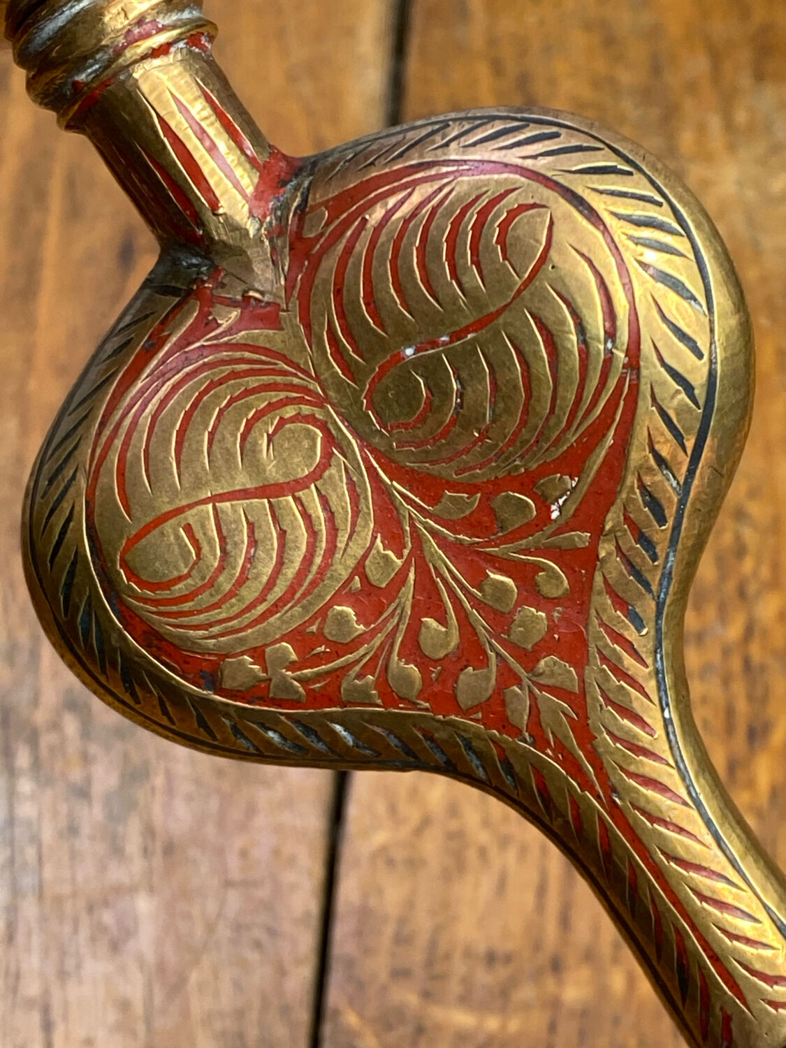 Chiseled brass cobra candlestick