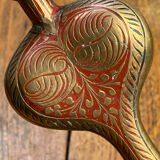 Chiseled brass cobra candlestick