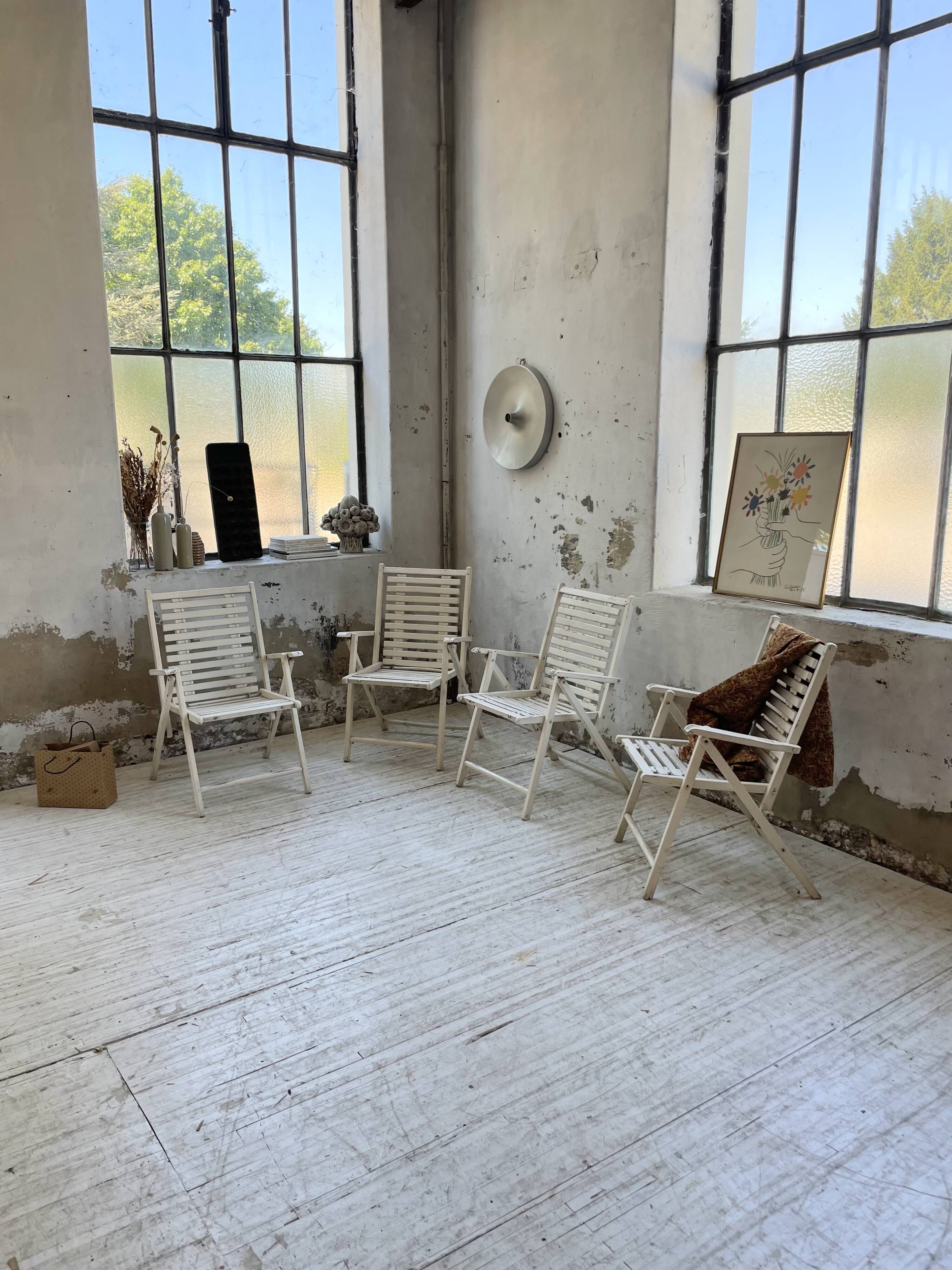 4 white wooden garden chairs