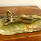 Art Deco female sculpture in bronze with onyx base.