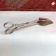 Wrought silver plated cake clips