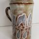 a ceramic jug signed by Yannick Chureau in Millau