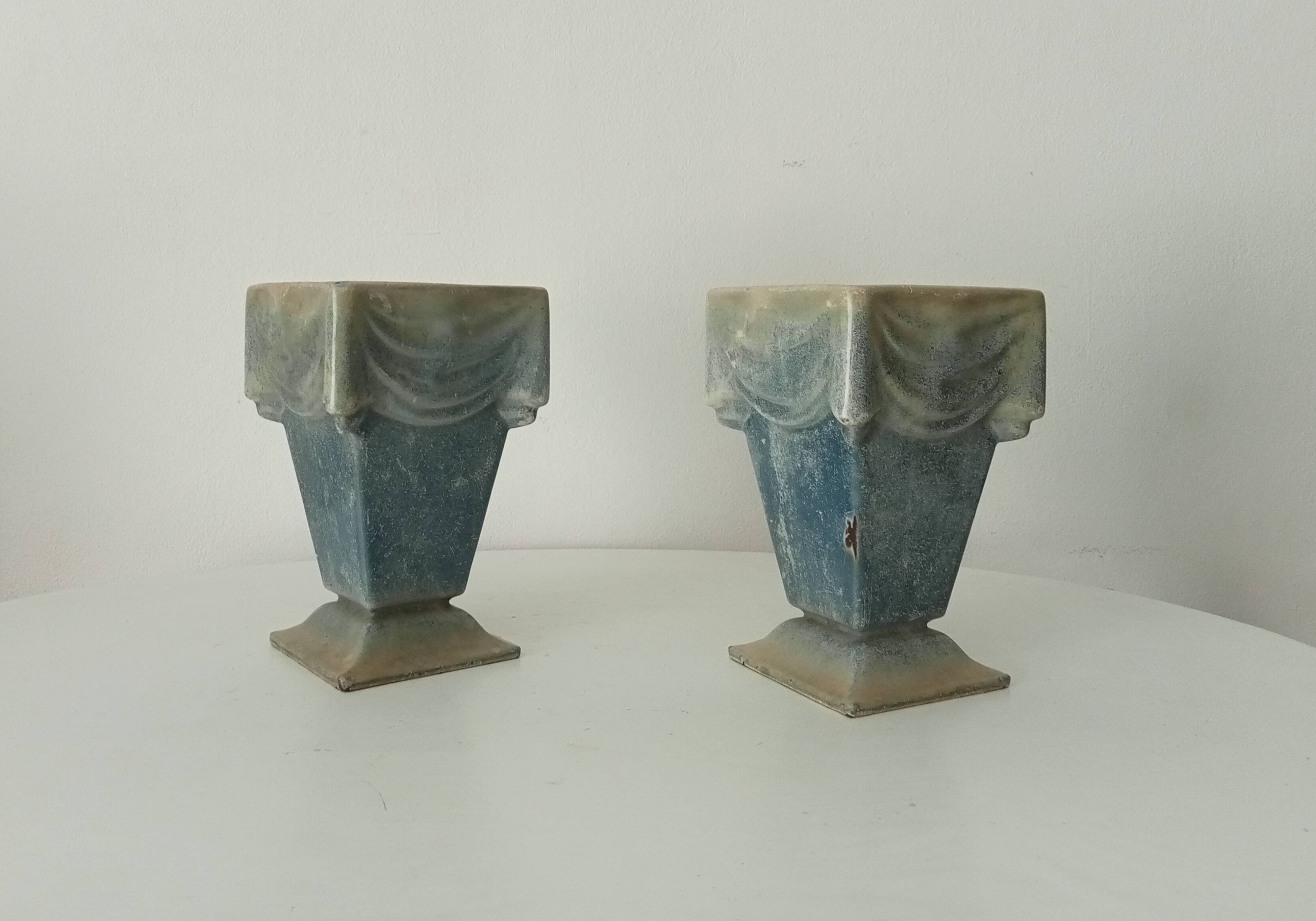 Pair of old art deco vases in enameled cast iron