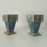Pair of old art deco vases in enameled cast iron