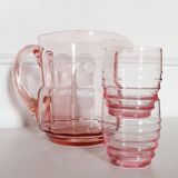 Pitcher and 2 glasses in pink glass