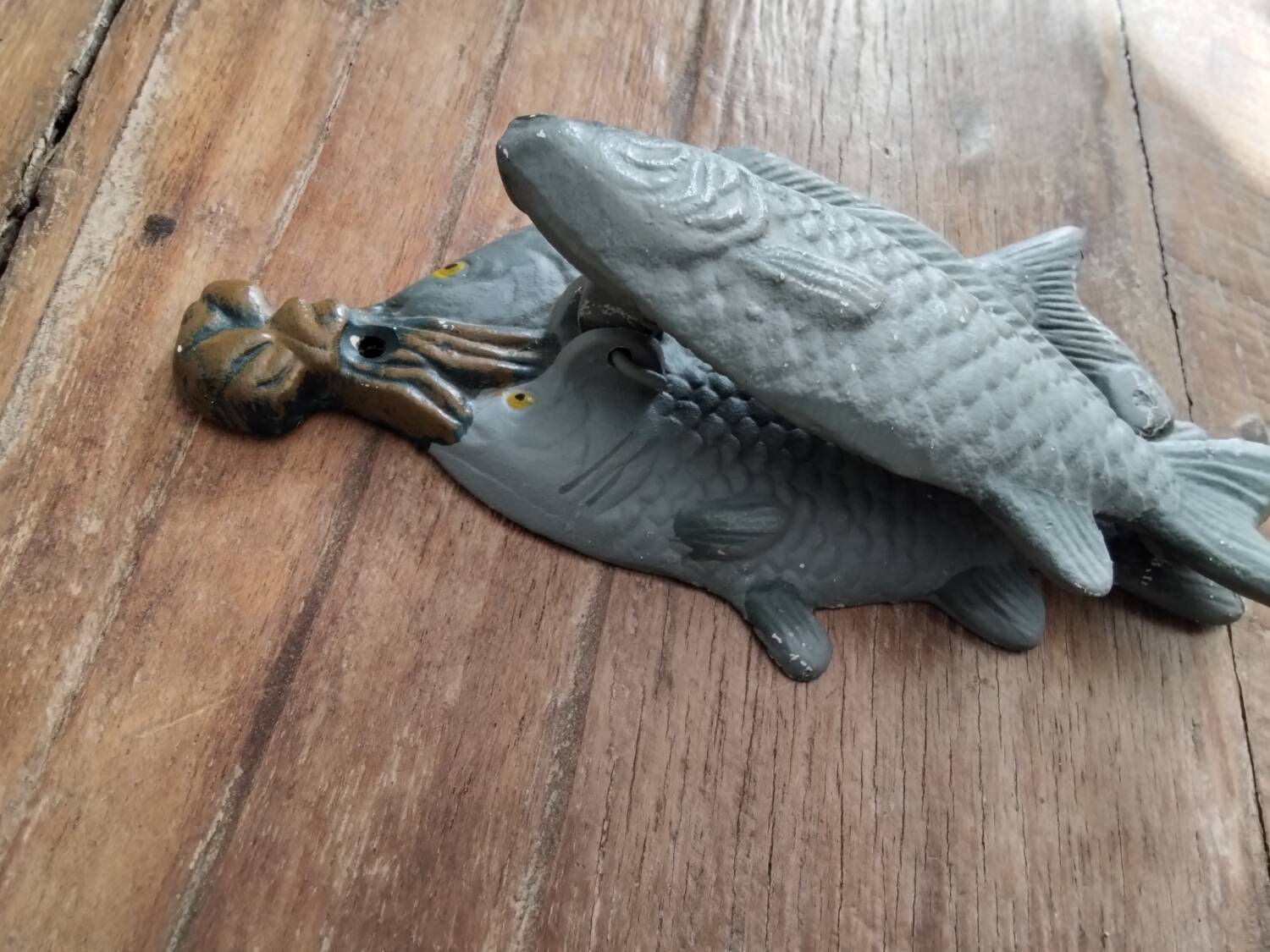Heurtoir en fonte trio de poissons