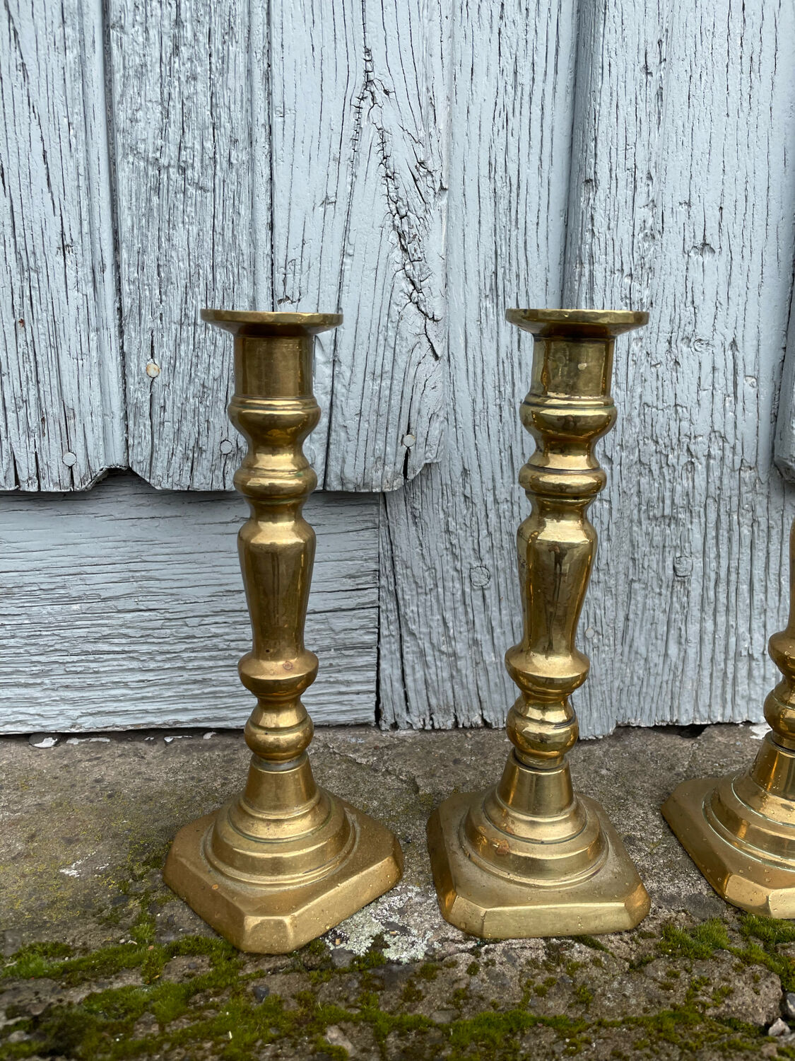 4 Victorian brass candlesticks
